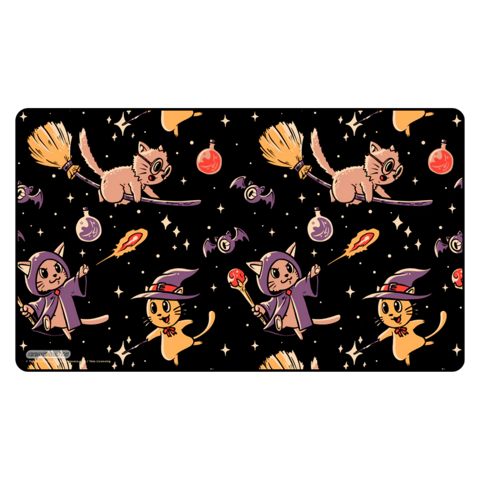 Halloween-themed playmat with cats in witch costumes casting spells and riding broomsticks on a black background